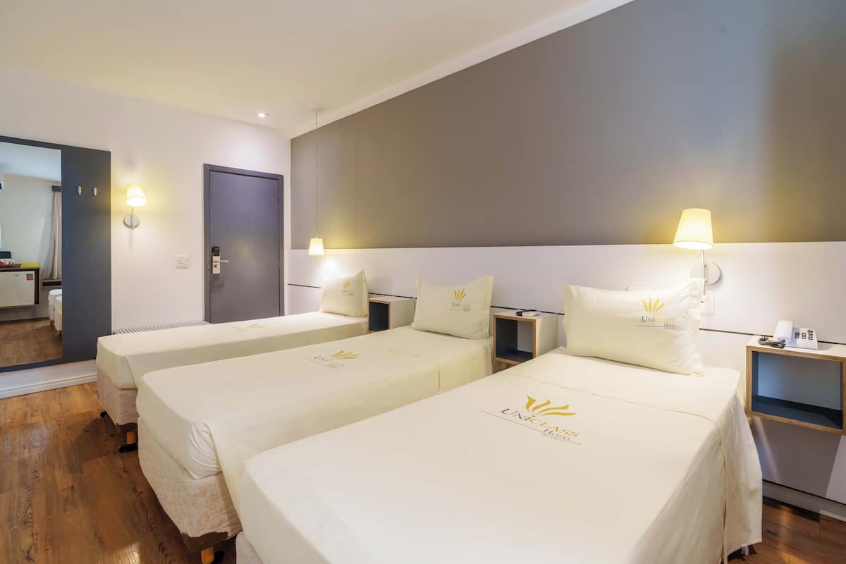Standard Triple Room | Minibar, desk, free WiFi, bed sheets