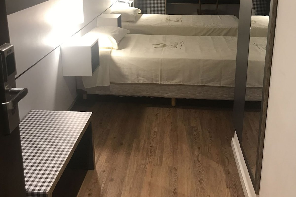 Desk, free WiFi, bed sheets