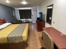 Habitación Deluxe, 1 cama de matrimonio grande, fumadores | Escritorio, sistema de insonorización, wifi gratis y ropa de cama
