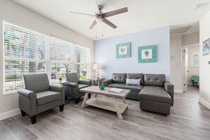 House, 1 Queen Bed with Sofa bed, Garden View (Sun and Sea - 1) | Living area | Flat-screen TV