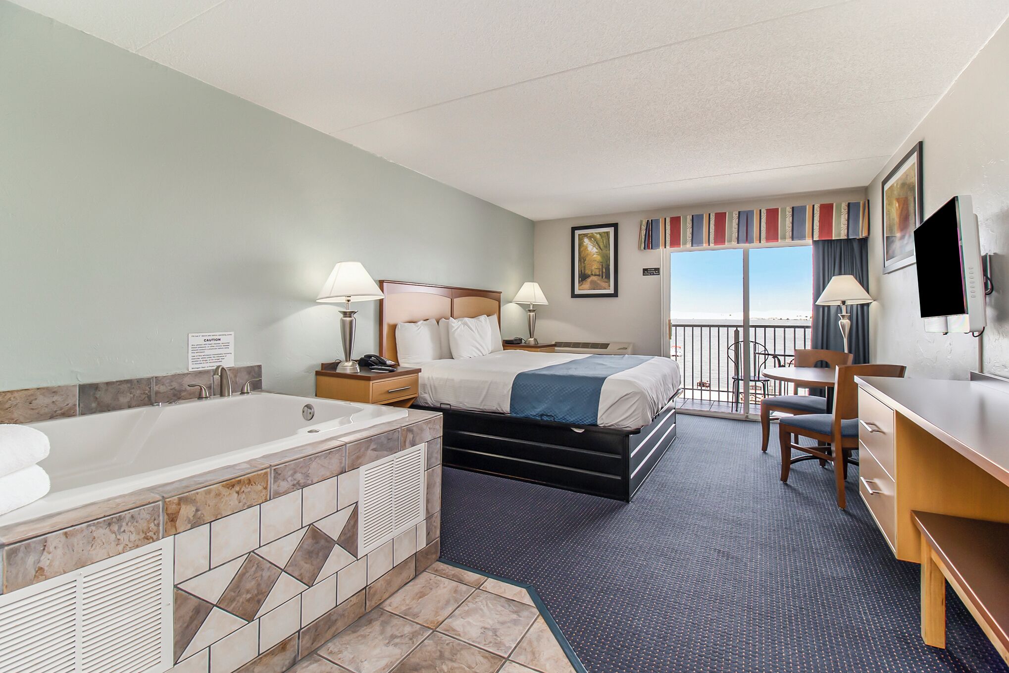 Premium Room, 1 King Bed, Hot Tub, Lakeside | Desk, iron/ironing board, free WiFi, bed sheets