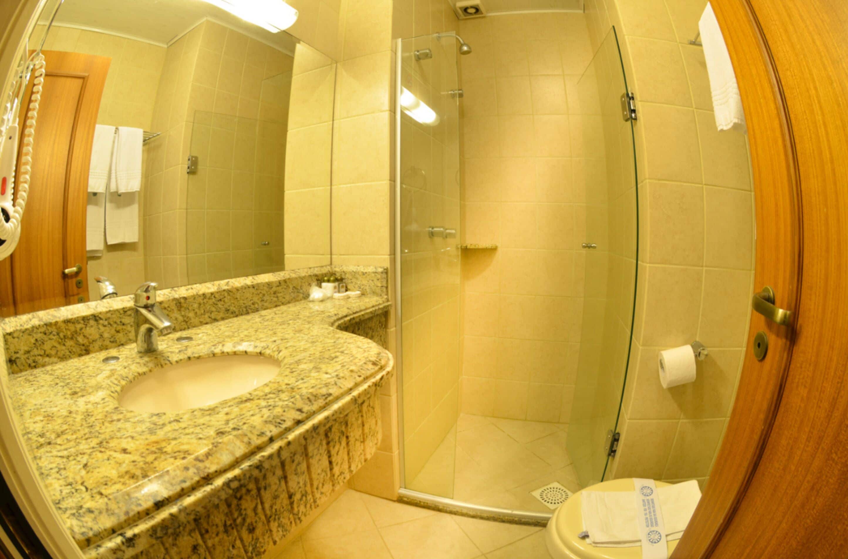 deluxe room | bathroom | shower, free toiletries, hair dryer, towels