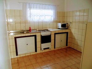 Apartment, 2 Bedrooms | Private kitchen | Fridge, microwave, oven, stovetop - Ingleses Residence II (Florianópolis)