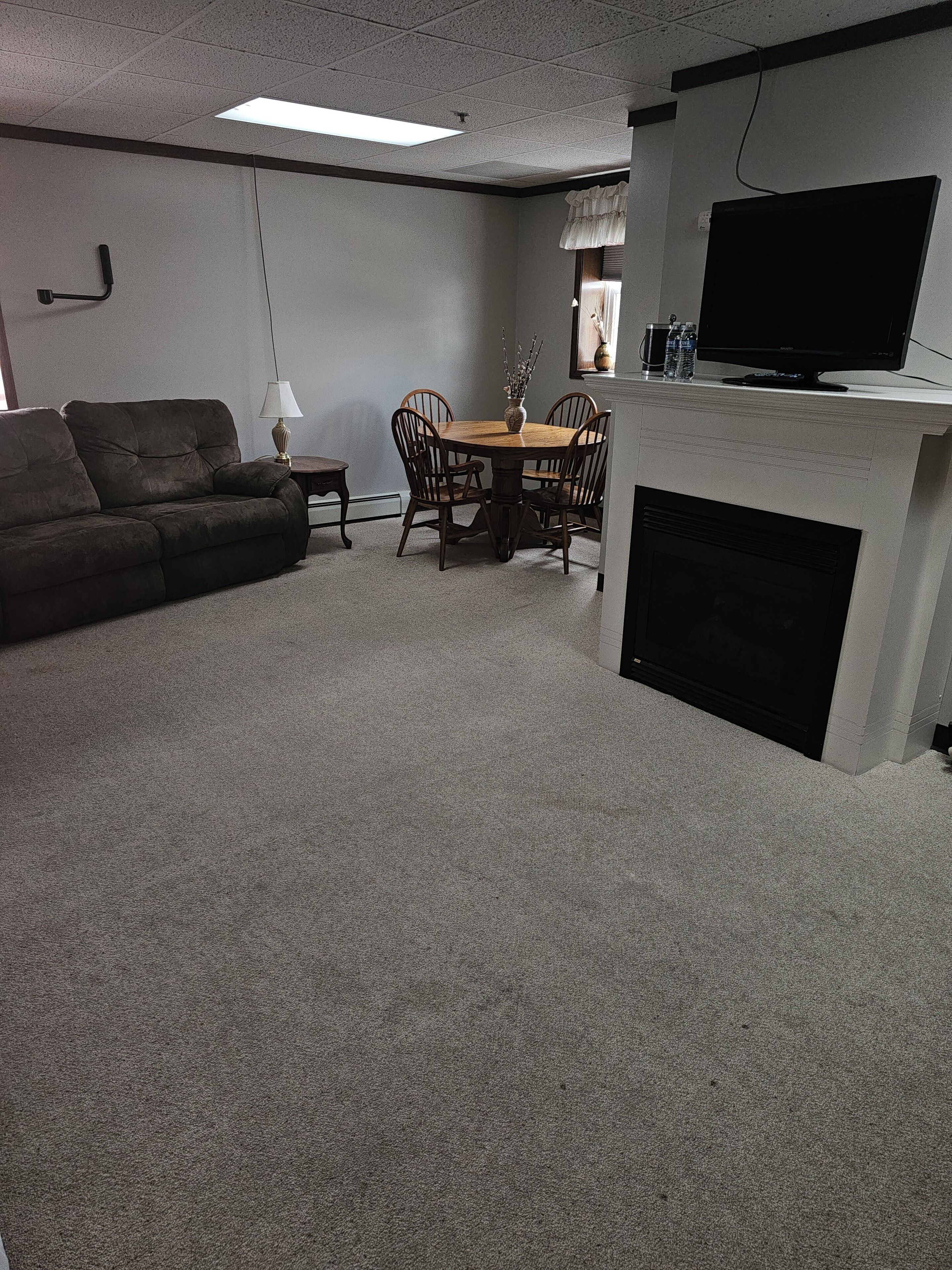 lodge suite, 2 queen beds | living area | tv