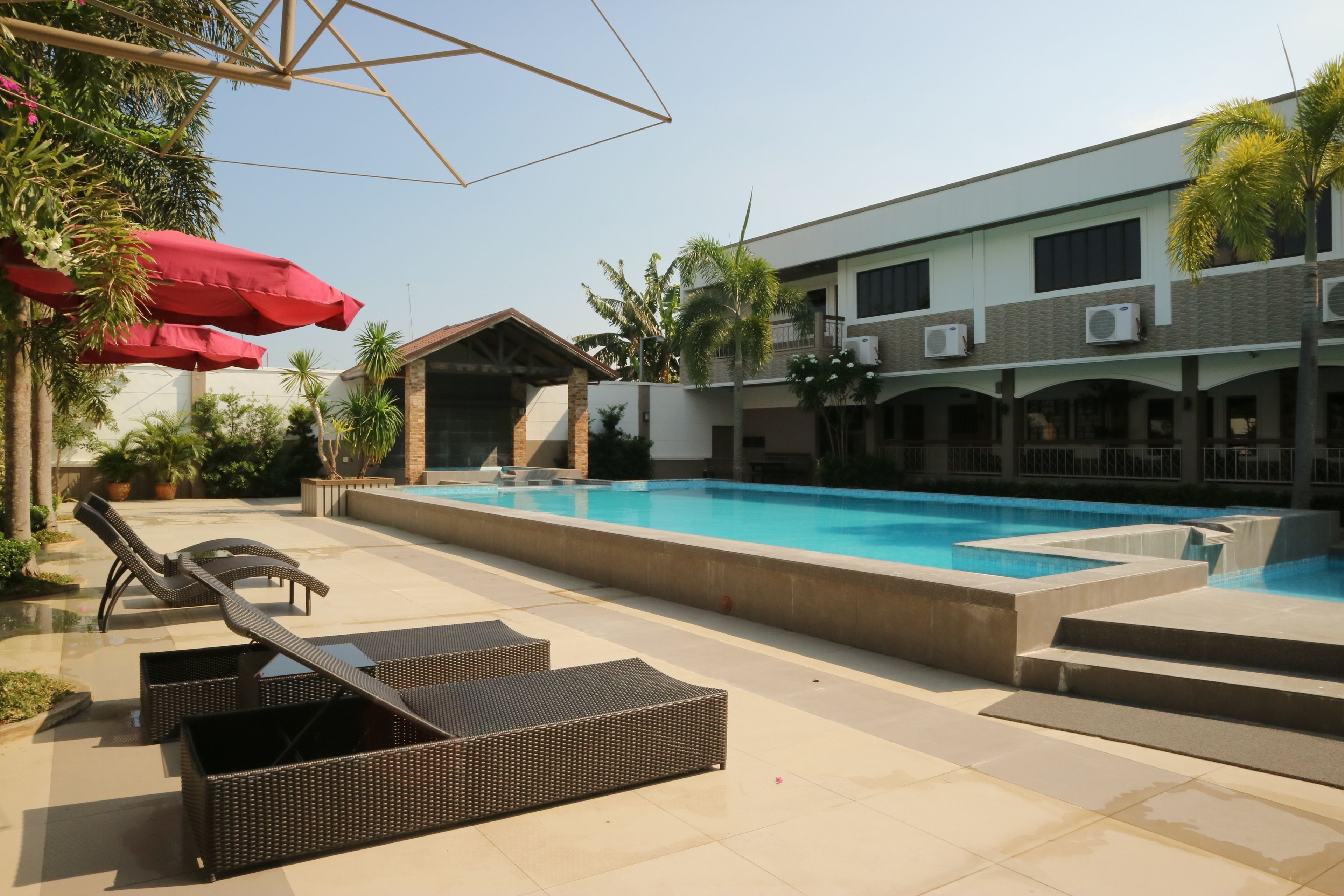 Outdoor pool, pool umbrellas, sun loungers