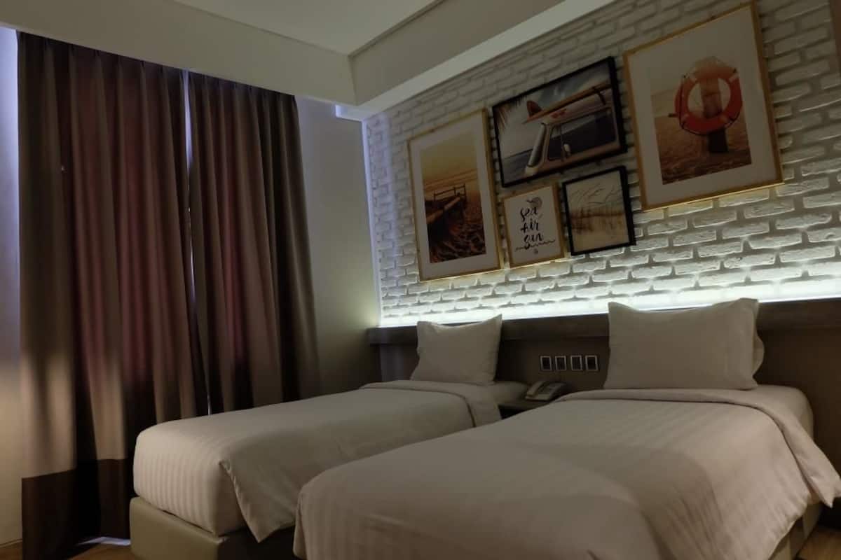 Quarto duplo superior, vista para a cidade | Escrivaninha, Wi-Fi de cortesia, roupa de cama