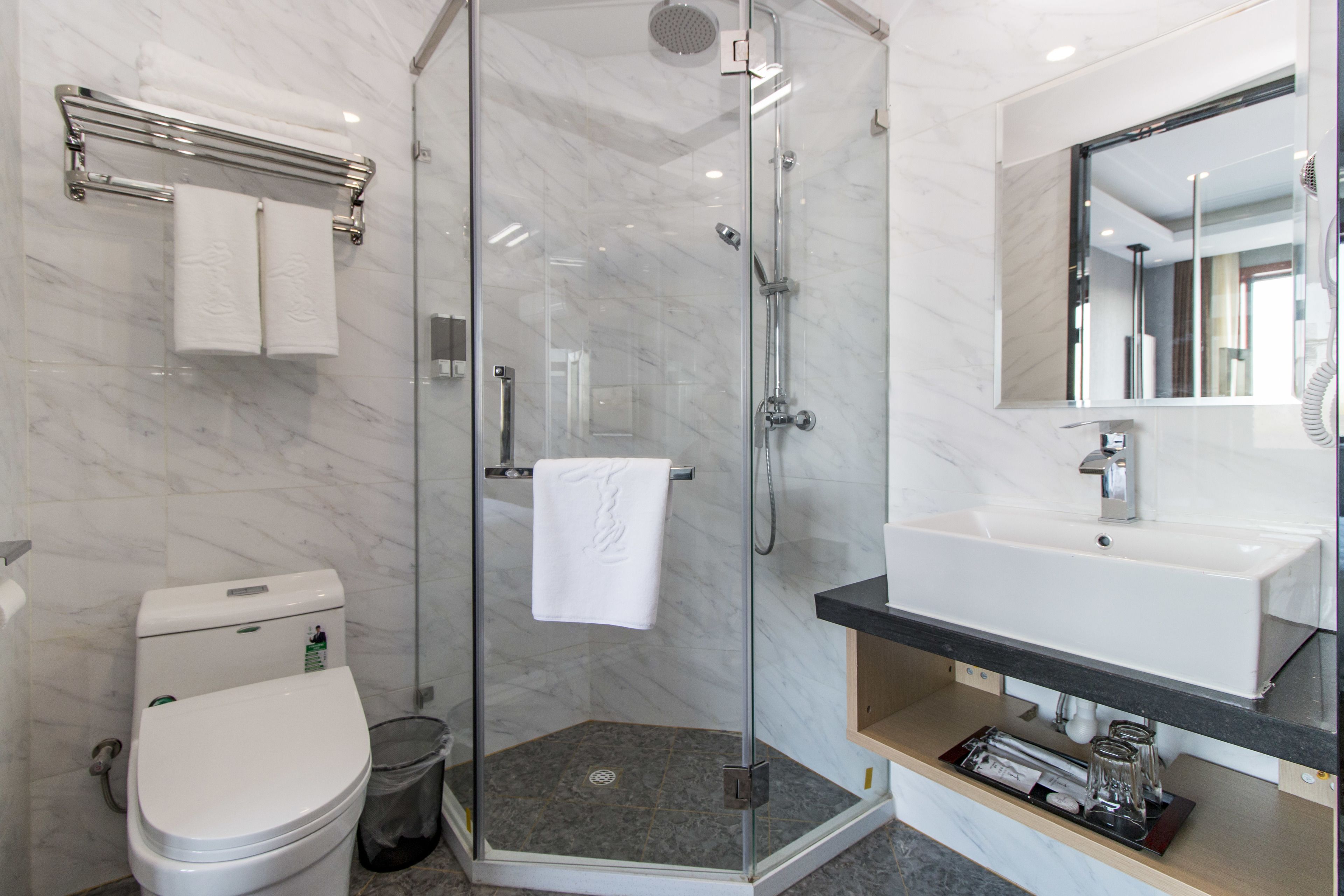 superior twin room | bathroom | shower, free toiletries, hair dryer, slippers