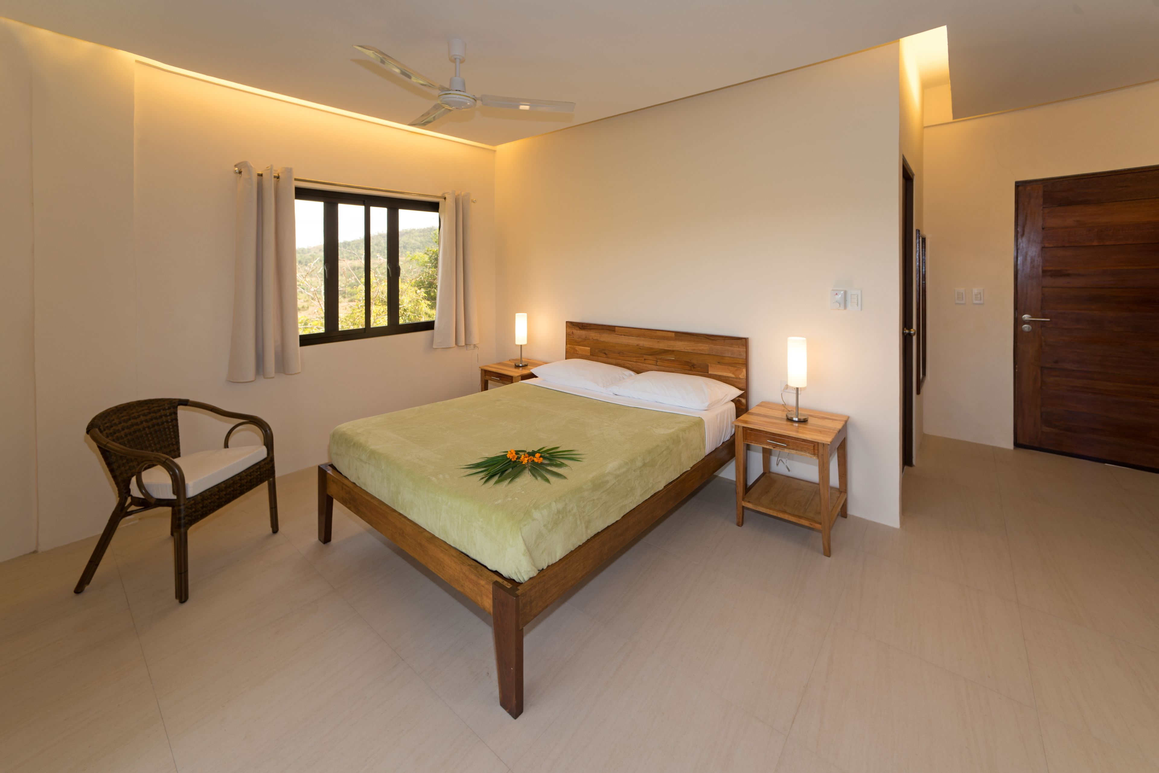 deluxe room, balcony | minibar, in-room safe, desk, blackout curtains