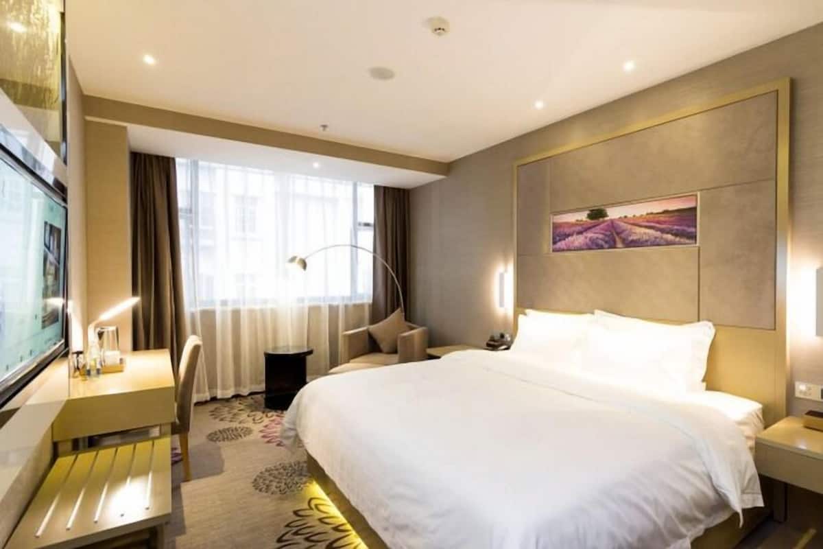 Pillowtop-bedden, een minibar, een bureau, verduisterende gordijnen