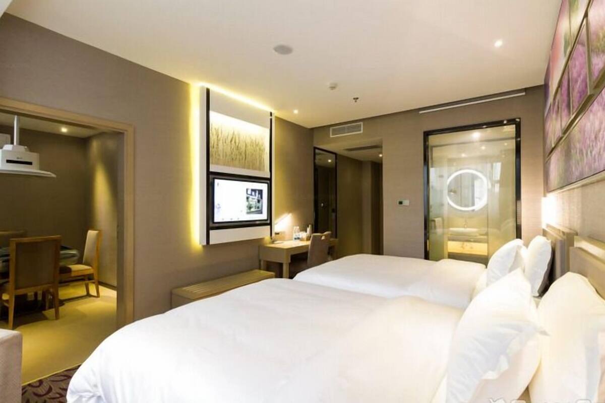 Chambre Confort avec lits jumeaux | Surmatelas, minibar, bureau, rideaux occultants