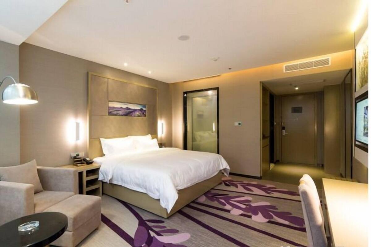 Familiekamer, 1 queensize bed | Pillowtop-bedden, een minibar, een bureau, verduisterende gordijnen