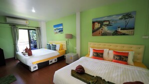 A hotel room with two beds, a green wall, and a painting of a coastal scene. - P.U. Inn Resort (Ayutthaya)