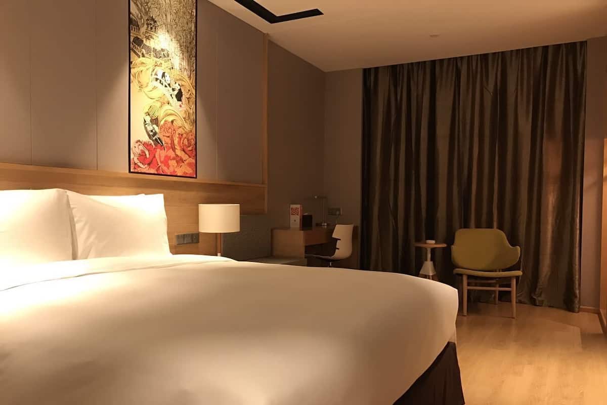 Superior Double Room | Minibar, desk, blackout drapes, iron/ironing board