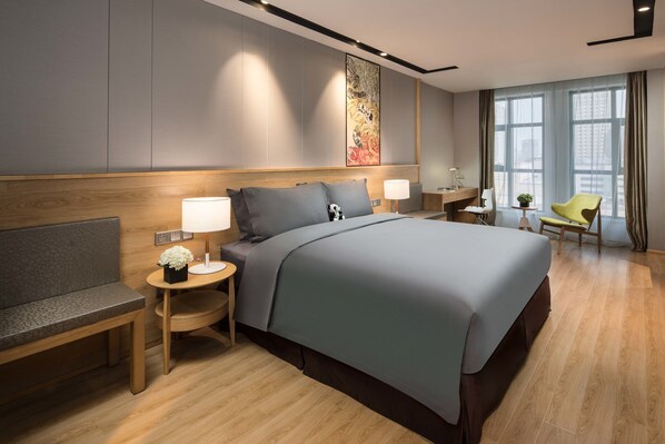 Executive kamer | Een minibar, een bureau, verduisterende gordijnen