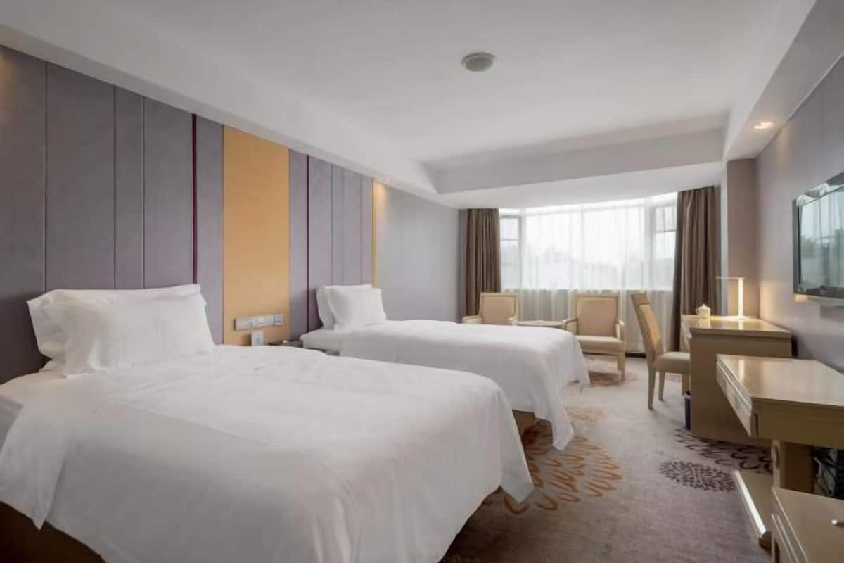 Desk, blackout drapes, rollaway beds, free WiFi