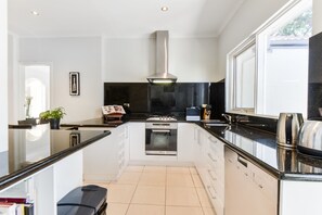 2 Bedroom Villa with 2 Bathrooms and 2 Living Rooms | Private kitchen | Full-sized fridge, microwave, oven, stovetop