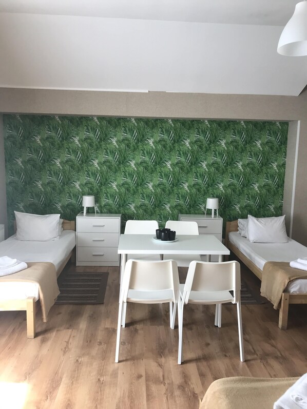 Basic Quadruple Room | Blackout curtains, iron/ironing board, free WiFi, bed sheets