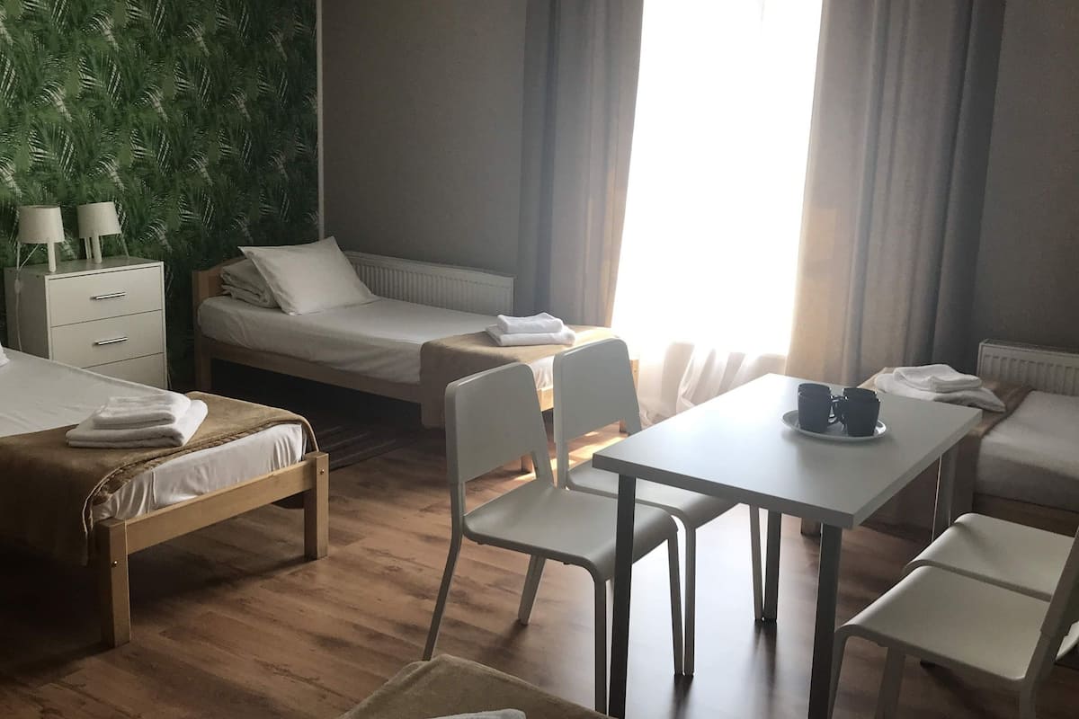 Basic Quadruple Room | Blackout drapes, iron/ironing board (on request), WiFi (free)