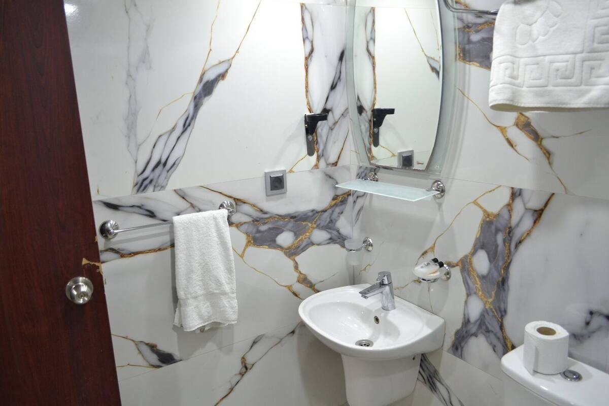 free toiletries, hair dryer, slippers, towels