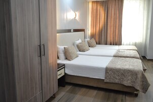 Suite, City View | Premium bedding, minibar, desk, soundproofing