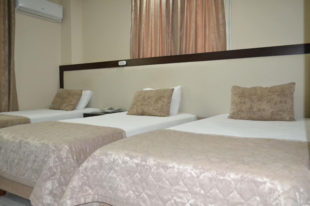 standard triple room, city view | premium bedding, minibar, desk, soundproofing