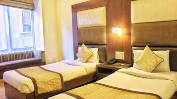 Deluxe Room, Private Bathroom | Desk, blackout curtains, soundproofing, iron/ironing board