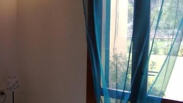 Apartment, 1 Bedroom | Iron/ironing board, cots/infant beds, WiFi