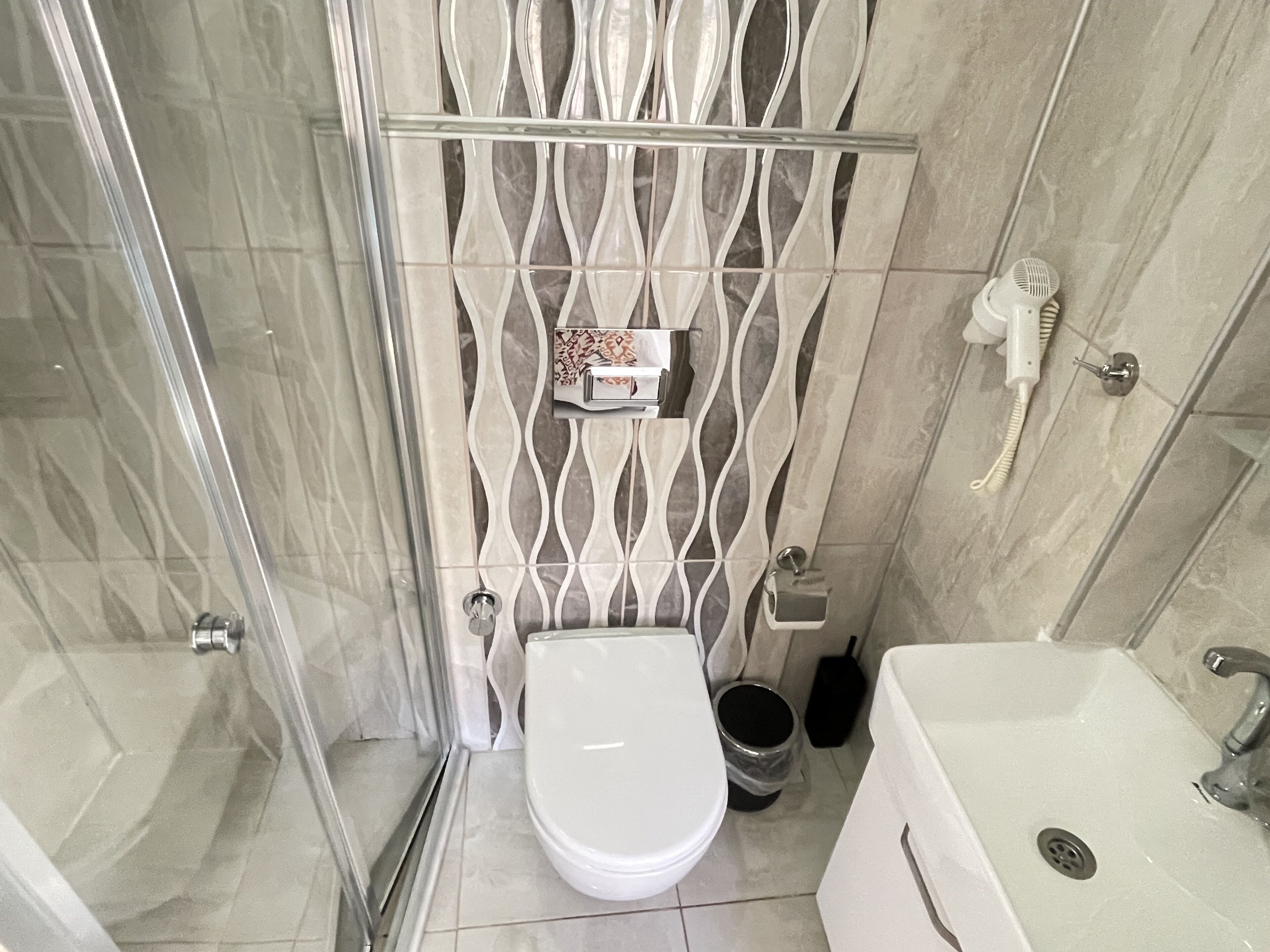 deluxe triple room | bathroom | shower, free toiletries, hair dryer, slippers