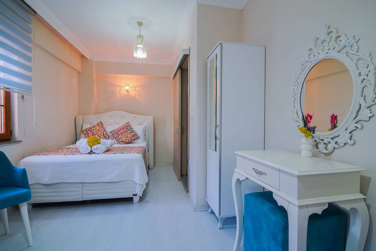 Kamar Triple Deluks | Setrika/meja setrika, Wi-Fi gratis, dan seprai linen