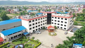 A hotel with a central courtyard, multiple floors, and a surrounding urban area. - Suva Hotel (Birendranagar)