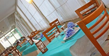 Breakfast, lunch, dinner served; local cuisine 