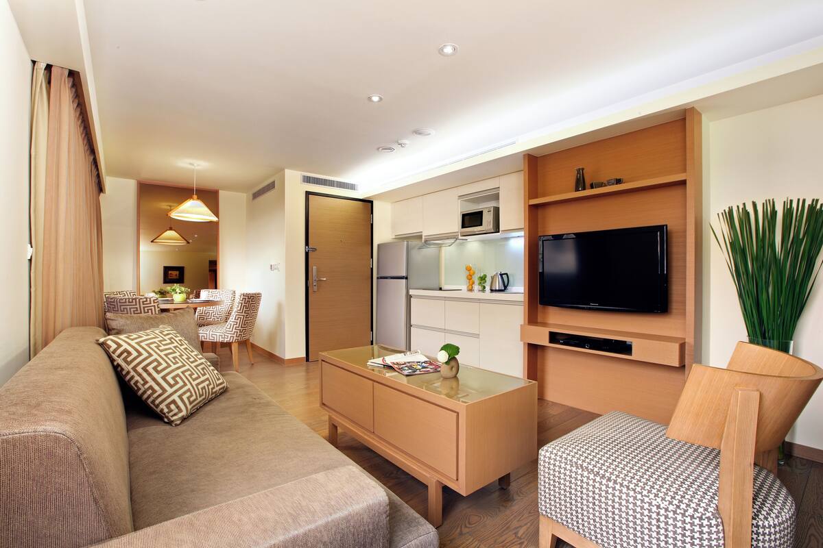 Family Quadruple Room, 2 Bedrooms | Living area | 40-inch LCD TV with cable channels, TV