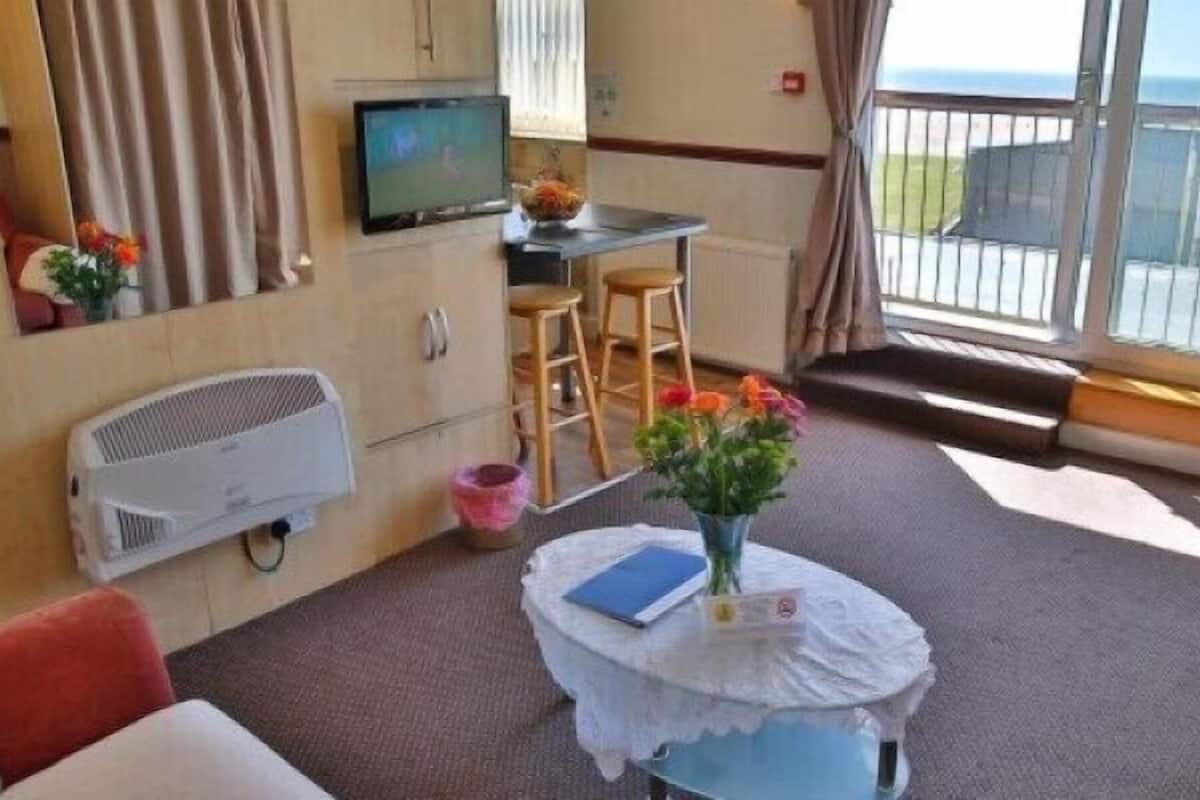 Studio, Patio, Sea View (#8) | Living room