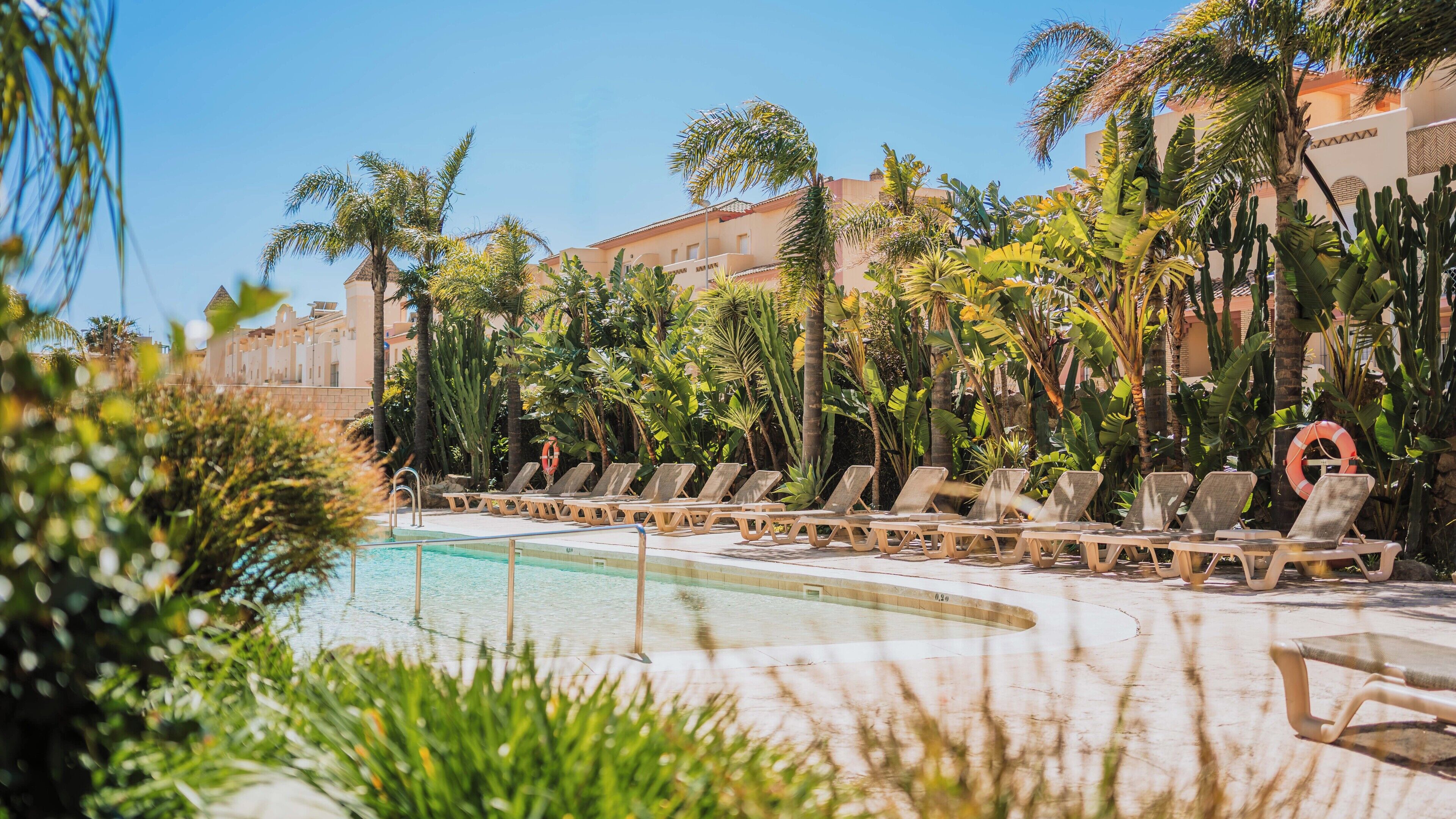 Indoor pool, seasonal outdoor pool, sun loungers, lifeguards on site