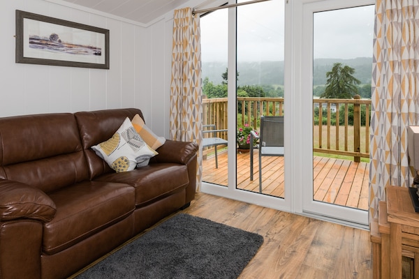 Chalet, 1 Bedroom (Little lodge (1) - no dogs or pets) | Living area | Flat-screen TV