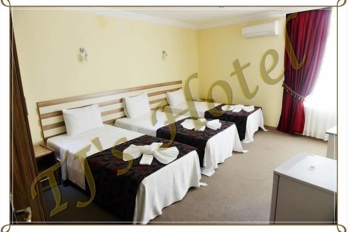 Standard Quadruple Room | Minibar, in-room safe, desk, soundproofing