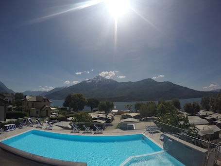 Outdoor pool, open 9:30 AM to 7:30 PM, pool umbrellas, pool loungers. Campeggio Paradiso