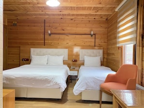 Triple Room, Multiple Beds | Minibar, desk, soundproofing, free WiFi