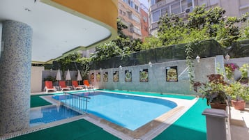 Outdoor pool, pool umbrellas, pool loungers