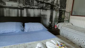 Triple Room (private bathroom not in room) | Minibar, desk, soundproofing, cribs/infant beds