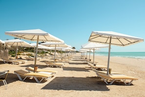 Private beach, sun-loungers, beach umbrellas, beach towels