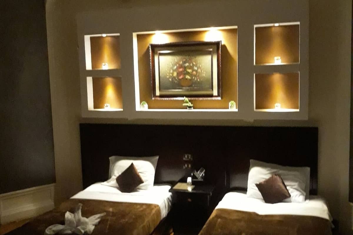 Egyptian cotton sheets, premium bedding, minibar, in-room safe
