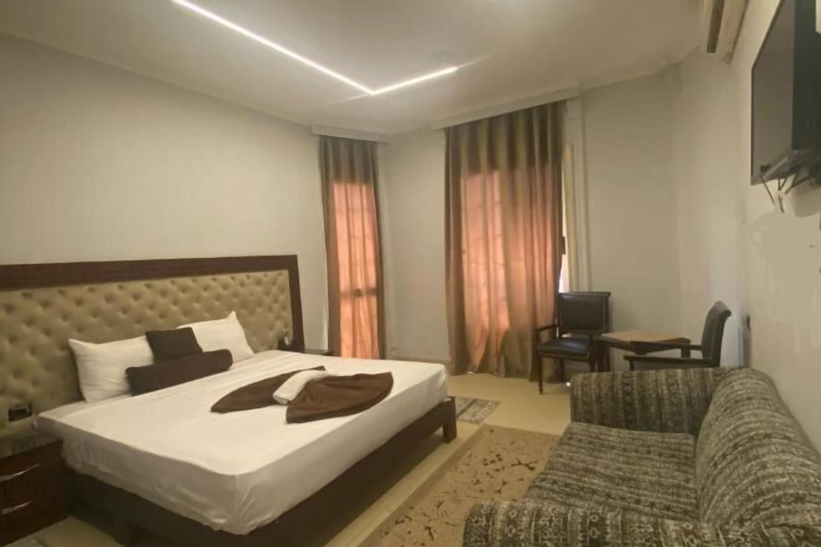 Egyptian cotton sheets, premium bedding, minibar, in-room safe