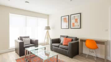 Luxury Apartment, 1 Double Bed, City View | Living room | 55-inch Smart TV with digital channels, Netflix, streaming services