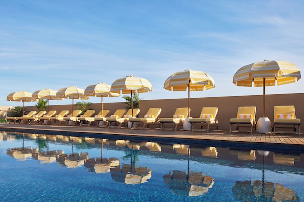 Outdoor pool, pool umbrellas, pool loungers