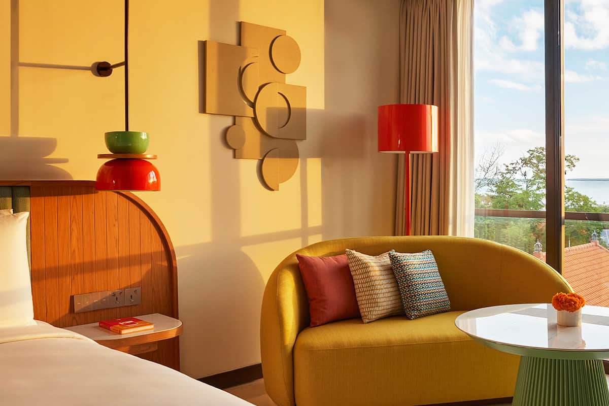 Room, 1 King Bed (Neighborhood View) | Minibar, in-room safe, desk, laptop workspace