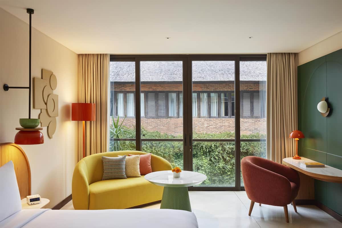 Room, 1 King Bed (Street View) | Minibar, in-room safe, desk, laptop workspace