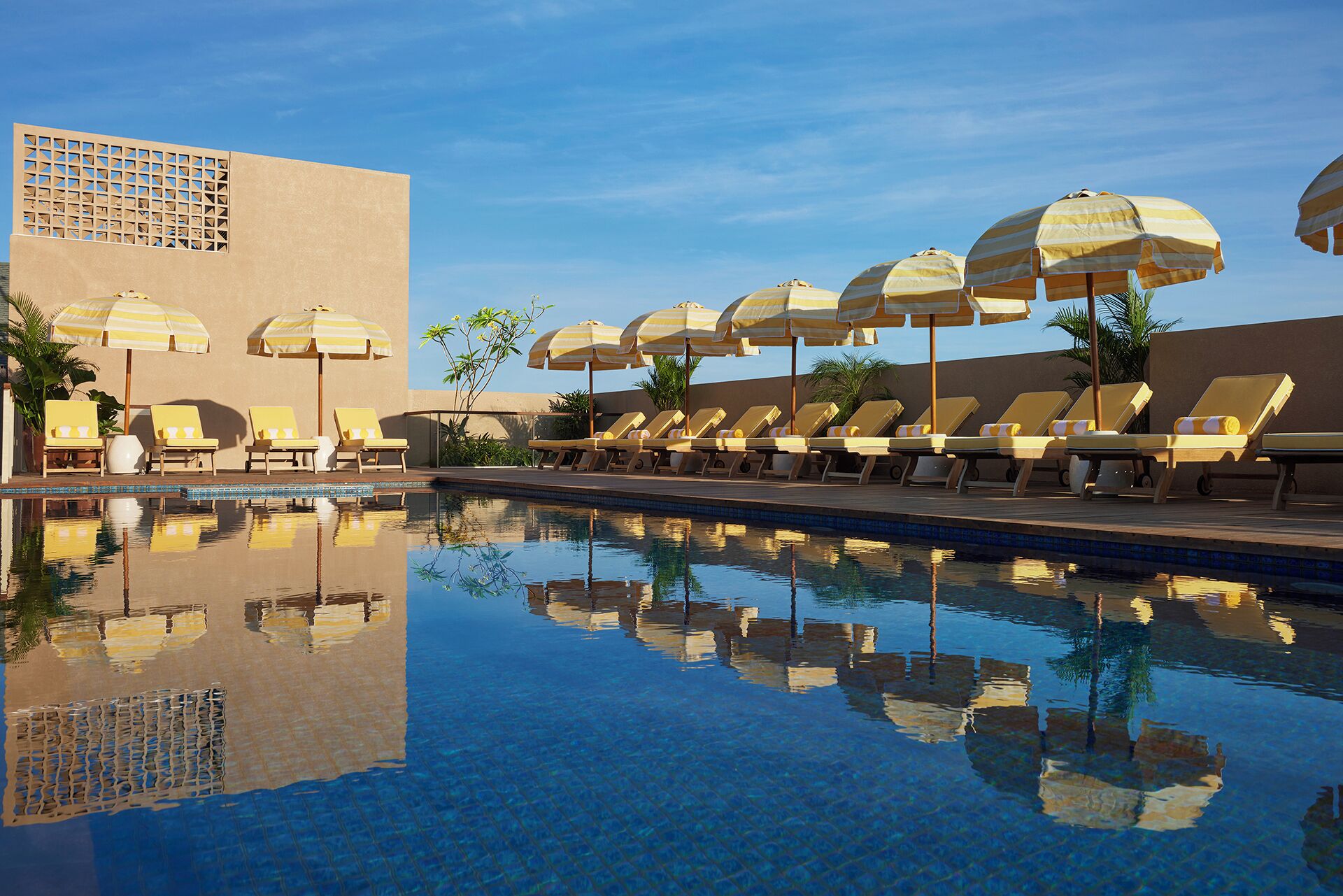 Outdoor pool, pool umbrellas, sun loungers