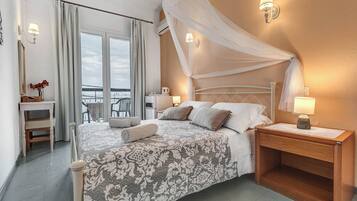 Classic Double or Twin Room, Sea View | Individually decorated, individually furnished, desk, laptop workspace