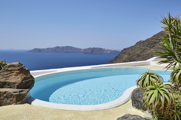 Outdoor pool, pool umbrellas, pool loungers